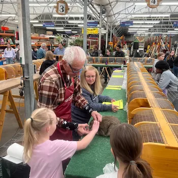 Image of a judge teaching children about rabbits